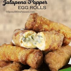 egg rolls stacked on top of each other with text overlay that reads jalapeno popper egg rolls