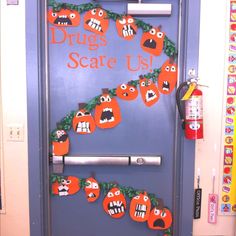 a door decorated to look like halloween decorations