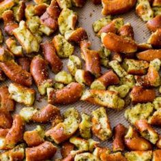 some kind of food that is sitting on a pan and ready to be cooked in the oven