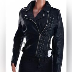 Women’s Member’s Only Faux Leather Laced Up Zippered Biker Jacket-Black Front Zip Closure Notched Collar Long Sleeved Zipped Cuffs Lined 20 1/2″ Length Side Zip Pockets 100% Polyurethane Epaulets Spring Rocker Style Leather Jacket With Long Sleeves, Spring Rocker Leather Jacket For Biker Events, Spring Rocker Outerwear For Biker Events, Rocker Style Outerwear For Biker Events In Spring, Rocker Style Spring Outerwear For Biker Events, Winter Rocker Style Biker Jacket, Spring Black Biker Jacket, Edgy Leather Jacket For Biker Events In Spring, Black Rocker Style Spring Outerwear