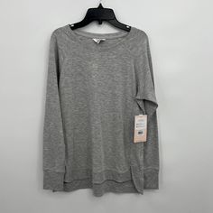 Danskin Women's Gray Long Sleeve Boat Neck Pullover Sweatshirt Size S Condition: New With Tags Size: Small Measurements: 19" From Pit To Pit, 27" From Shoulder To Hem Color: Gray Material: 67% Polyester/ 29% Modal/ 4% Spandex Boat Neck Wide Neck Long Sleeves Pullover Raglan Sleeves Sustainable Please Feel Free To Ask Any Questions Before Purchasing, Thank You! Heather Grey Long Sleeve Sweater For Loungewear, Heather Grey Long-sleeved Sweater For Loungewear, Cozy Raglan Sleeve Tops With Ribbed Cuffs, Tops With Ribbed Cuffs And Raglan Sleeves For Layering, Casual Sweater With Raglan Sleeves, Casual Long Sleeve Cozy Fit Top, Casual Long Sleeve Top With Cozy Fit, Raglan Sleeve Tops For Winter Layering, Winter Raglan Sleeve Tops For Layering