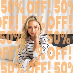 a woman sitting on top of a bed in front of a white curtain with 50 % off