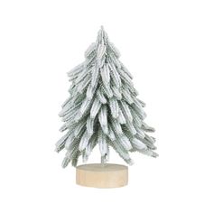 a small white christmas tree sitting on top of a wooden stand