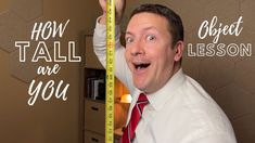 a man holding a measuring tape in front of him with the words how tall are you?