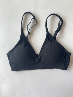 A-B cup V bra. Our convertible V Bras come in 2 cup sizes A/B & C/D The back straps can be criss crossed to accommodate racerback tops Sports Bra With Built-in Bra, Racerback, Solid Strappy Sports Bra, Black Triangle Top Sports Bra With Built-in Bra, Solid Color Strappy Sports Bra, Black Push-up Sports Bra With Removable Pads, Strappy Stretch Bra With Built-in Support, Push-up Black Sports Bra With Removable Pads, Fitted Triangle Top Sports Bra With Removable Pads, Solid Color Sports Bra With Adjustable Strappy Back