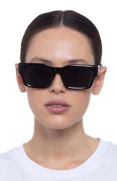 Smooth rectangular frames define these sleek sunglasses fitted with smoky-tinted lenses. 52mm lens width; 20mm bridge width; 145mm temple length 100% UV protection Plastic Imported Sleek Shield Sunglasses With Tinted Wayfarer Lenses, Sleek Shield Sunglasses With Tinted Lenses In Wayfarer Style, Sleek Wayfarer Shield Sunglasses With Tinted Lenses, Classic Black Rectangular Shield Sunglasses, Classic Rectangular Cat Eye Sunglasses With Tinted Lenses, Classic Cat Eye Sunglasses With Tinted Lenses, Sleek Rectangular Sunglasses With Gradient Lenses, Classic Square Sunglasses With Tinted Lenses, Classic Rectangular Cat Eye Sunglasses With Mirrored Lenses