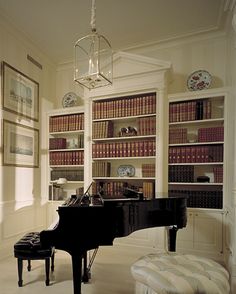 an image of a room with bookshelves and a piano in the middle is featured on instagram