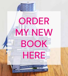 a stack of books with the words order my new book here in pink and blue