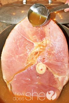 ham being cooked in a frying pan with a ladle