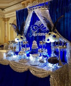 a table topped with lots of cake and desserts