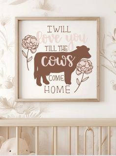 a baby's room with a bear and flowers on the wall next to a crib