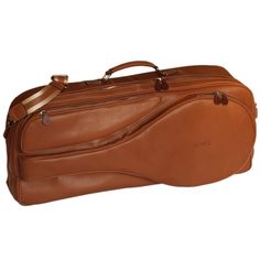 a brown leather instrument case on a white background