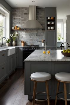 two stools are in front of the kitchen counter