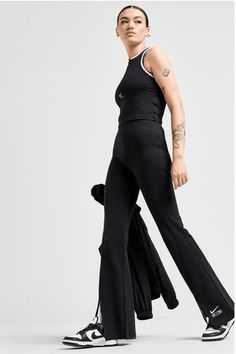 Get A Standout Staple Style With These Women's Air Split Flare Leggings By Nike. In A Black Colourway, These Leggings Are Cut From A Thick But Lightweight Poly Blended Fabric With Added Stretch For Max' Comfort. It Features A High-Waisted Elastic Waistband For A Relaxed Feel, While Split Hem Lets You Showcase Your Sneakers. Finished With Embroidered Nike Branding To The Ankle. Machine Washable. | Our Model Is 5'9" And Wears A Size Small.. Material: 47% Cotton; 41% Polyester; Flared Split Leggings Outfit, Split Leg Flare Leggings, Black Full Length Sportswear Tights, Full-length Compressive Sportswear Leggings, Black Stretch Full-length Flares, Black Trainers, Jd Sports