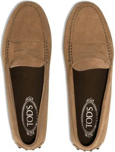 Step into style and comfort with these classic loafers from Tod's. With their rich brown suede and sleek crossover strap detail, these slip-on almond toe shoes are the perfect blend of sophistication and ease. Brown suede material Crossover strap detail Slip-on style for easy wear Almond toe for a stylish touch Flat rubber sole for all-day comfort Classic Loafers, Versace Bags, Birkin 25, Balenciaga Designer, Driving Shoes, Suede Material, Toe Shoes, Fendi Bags, Lv Bag