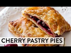 two pastries on a plate with the words cherry pastry pies over it's image