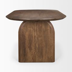 a wooden table with an oval shaped top and curved legs, on a white background