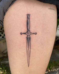 Thigh Knife Tattoo, Mideaval Tattoo Design, Dagger Back Tattoo Women, Feminine Knife Tattoo, Midevil Tattoo Ideas, Outer Hand Tattoo, Economics Tattoo, Dagger With Wings Tattoo, Small Dagger Tattoo Simple