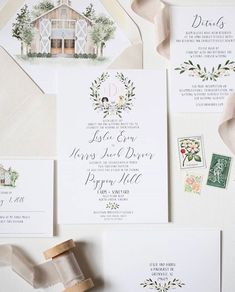 an assortment of wedding stationery and envelopes