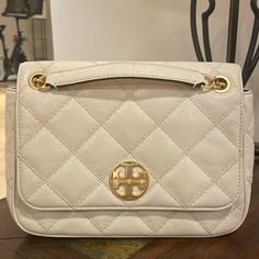 Beautiful Bag For Any Occasion. Great Condition With Very Little Wear. Classic Cream Bags With Cc Turnlock Closure, Cream Bags With Cc Turnlock Closure, Cream Shoulder Bag With Silver-tone Hardware For Shopping, Cream Shoulder Bag With Gold-tone Hardware And Double Handle, Tory Burch Ivory Bags, Tory Burch Bag, Small Purse, Beautiful Bags, Tory Burch