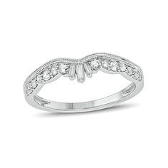 a white gold wedding ring with diamonds