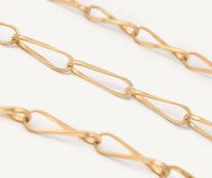 In this long necklace, fine 18K yellow gold strands crafted with our exclusive coil technique create captivating figure-eight shapes. The result is a play on the infinity symbol, a small masterpiece of goldsmithing. Infinity Symbol, Blue Springs, Branded Gifts, Jewelry Techniques, Link Necklace, High Jewelry, Ring Bracelet, Jewelry Branding, Long Necklace