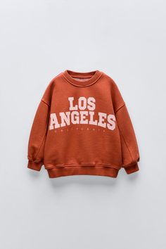 “LOS ANGELES” SWEATSHIRT - Russet | ZARA United States Los Angeles Sweatshirt, Stylish Baby Girl Outfits, Light Grey Leggings, Stylish Baby Girls, Simple Sweatshirt, Retro Sweatshirts, Cardigan Sweater Dress, Round Neck Sweatshirts, Stylish Baby