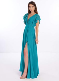 a woman in a blue dress with a slit