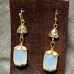 One Brand New Pair Of Earrings Featuring Frosted Crystal “Beach Glass” With Pale Pink Enamel Bead Caps, And A Vintage Clear With Gold Embossed Pyramid Eye Bead, And Gold Finish Findings. They Measure 1 7/8” Long Including The Earwire, Which Is A Gold Finish Hypoallergenic Shepherds Hook Style. Bundle Any 2 Or More Items From My Closet And Get A 20% Discount. Adjustable White Crystal Earrings, Elegant Dangle Beaded Earrings For Beach, Elegant Beaded Dangle Earrings For Beach, Elegant Adjustable Beaded Glass Earrings, Elegant Teardrop Beaded Earrings For Beach, White Glass Jewelry For Festivals, Handmade White Glass Earrings, White Glass Festival Jewelry, Festive White Crystal Earrings