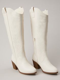 These dreamy-heeled boots are detailed with western-inspired stitching that adds a touch of rustic charm to your look, bringing out your inner cowgirl spirit. The wide width and wide calf design ensure a comfortable fit that accommodates various foot sizes and shapes, allowing you to step out with confidence and ease. Wide Calf, Calf Boots, Christmas Dress, Christmas Sweatshirts, Dress With Boots, Rustic Charm, Heeled Boots, Bootie Boots, Shoe Boots