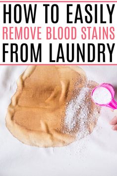 how to easily remove blood stains from laundry with pink scissors and powdered sugar on top