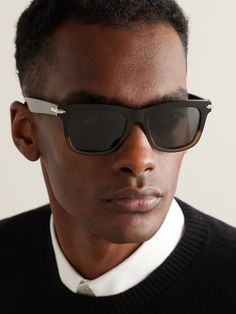 Dior Eyewear's 'Blacksuit S11I' sunglasses will create an immediate impression. Crafted from black and brown acetate, they have rounded D-frames that will bring a classic touch to any outfit. The wide arms are detailed with silver-tone hardware engraved with the house moniker. Round Sunglasses Men, Dior Eyewear, Dior Sunglasses, Acetate Sunglasses, John Hardy, Sunglasses For Men, Suede Jacket, Formal Shirts, Sunglass Frames