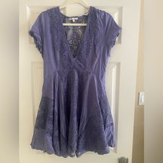 Lavender Lace Dress Brand New (Tag Was Removed But Dress Never Worn) Size L (Tts) And Lined On The Inside With A Side Zipper Closure Purple Short Sleeve Dress With Lace Trim, Lavender Bohemian Short Sleeve Dress, Summer Lavender Dress With Lace Trim, Flowy Purple Mini Dress With Short Sleeves, Summer Lavender Dresses With Lace Trim, Purple V-neck Dress With Lace Trim, Lavender V-neck Mini Dress For Spring, Spring Lavender V-neck Mini Dress, Lavender Lace Dress