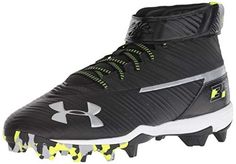 the under armour football cleats are black with neon yellow accents and white outs