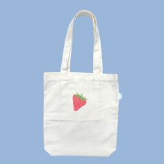 This bright red strawberry tote bag will add a pop of colour and liveliness to your wardrobe! Pair our strawberry tote bag with a cute little picnic outfit and you will be looking ‘berry’ sweet! All of our designs are double-sided so that you have the option to wear a more simple look, or a more bold look! Our tote bags also have an inner pocket! It is the perfect size to hold your phone, wallet, chapstick, and any little trinkets so you don’t have to dig around the bottom of your tote bag! Features: Inner pocket Fits laptop Spacious compartment Double-sided design Designed in Australia Artwork by Mel Instagram: melbdesign_ Material: 100% Cotton Calico Approximate Dimensions: Length: 40cm, Width: 34cm Handle length: 35cm Pocket: 17cm x 17cm Care instructions: Hand wash with cold water and Playful Red Summer Bags, Cute Red Bags For Spring, Cute Cotton Bags For Spring, Playful Red Everyday Bag, Summer Cotton School Bags, Summer School Cotton Bags, Red Bag With Strawberry Print As Gift, Cute Red Bags For Everyday Use, Casual Rectangular Bag With Strawberry Print