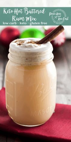 a mason jar filled with hot buttered rum