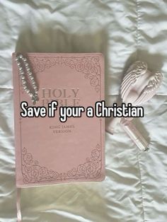 a pink book with the words save if your a christian on it next to a spoon