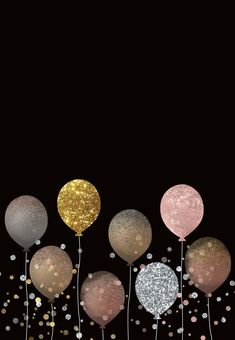 some balloons and confetti are in the air on a black background with gold, silver