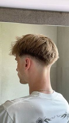 Blonde Low Fade Men, Taper Fade For Straight Hair, Mid Taper Fade Straight Hair, Drop Fade Textured Fringe, Blonde Skin Fade, Low Drop Fade Short Hair, Mid Fade Fluffy Fringe, Fades With Designs Haircut