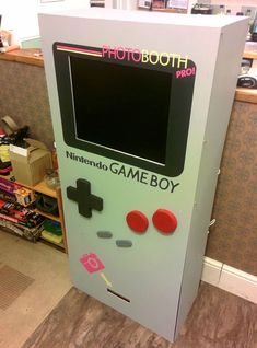 an old video game machine with the words nintendo game boy on it's side