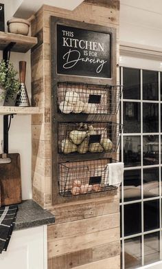 this kitchen is decorated with rustic wood and wire baskets filled with bread, pastries, and other items