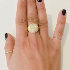 This round shaped signet style ring is composed of 14K solid gold & finished with a pavé diamond initial letter. The gemstones used in this design are of genuine GVs1 quality natural real diamonds. Ring Dimensions: Raised Round Surface: approximately 14mm (diameter) Signet Surface Height from Inner Band Thickness: approximately 4mm Inner Band Ring Thickness: approximately 4.5mm Metal Finish: High Shine Polish This design is available in Rose, White and Yellow 14K Gold This item is proudly ma White Gold Monogram Initial Ring, Classic Diamond Initial Ring With Monogram, Classic Diamond Monogram Initial Ring, Fine Jewelry Monogram Initial Ring, Classic Diamond Initial Ring Personalized, Classic Personalized Diamond Initial Ring, White Gold Initial Ring With Monogram, Luxury Sterling Silver Signet Ring With Initials, Everyday Yellow Gold Signet Ring With Initials