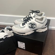 Chanel Women’s Sneakers Excellent Condition. See Front Right Shoe For Mark. Only “Flaw” On Both Shoes. Can Be Easily Cleaned. Size 39.5 / 9.5 Us Worn Only Few Times Comes With 2 Dust Cover Bags, Original Shoe Box And Ribbons&Flower Bought From Chanel Boutique Flower Bought, Chanel Women, Shoes Chanel, Chanel Sneakers, Chanel Boutique, Ribbon Flowers, Chanel Shoes, Dust Cover, We Wear