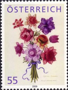 a stamp with an image of flowers in purple, pink and orange colors on it