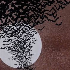 a large group of bats flying in front of a full moon