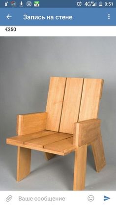 a wooden chair sitting on top of a table