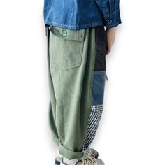 The Patchwork Pant is the perfect mix of bold style and comfy, casual vibes. This unisex pant features a supercool patchwork design on the front and soft army green cotton on the back, complete with two back pockets and button closures for extra flair. With a baggy, relaxed fit, these pants are easy to dress up or down and look amazing cuffed with a peek-a-boo fun sock. Made from 100% cotton, they’re breathable and perfect for all-day wear. Patchwork design on the front for standout style Soft army green cotton back for ultimate comfort Two back pockets with button closures for added functionality Baggy fit that’s perfect for any occasion Looks great cuffed with a fun sock for extra style Made from 100% cotton for breathable, all-day comfort The Patchwork Pant is your go-to for a cool, eff Bold Style, Romper Dress, Peek A Boo, Skirted Swimwear, Comfy Casual, Baggy Fits, Bold Fashion, Green Cotton, Cotton On