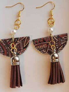 Elegant Brown Dangle Tassel Earrings, Brown Dangle Earrings With Tassels, Elegant Brown Adjustable Tassel Earrings, Brown Fringe Tassel Earrings For Gift, Brown Fringe Tassel Earrings As Gift, Brown Fringed Tassel Earrings Gift, Trendy Fringe Earrings As A Gift, Trendy Adjustable Tassel Earrings As Gift, Handmade Brown Tassel Earrings