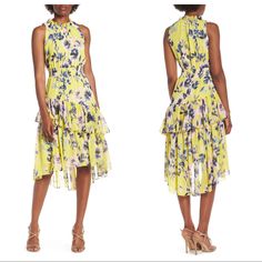 $168 Nwt Eliza J Floral Asymmetric Tiered Dress Brand New With Tags. Size: 14 Color: Citrus Details A Ruffled Neckline And Sunny Floral Print Detail A Smocked-Waist Dress Featuring A Fun, Floaty Tiered Skirt With An Asymmetrical Silhouette. - Back Keyhole With Button Closure And Hidden Zip Closure - Ruffled Neckline - Sleeveless - Lined - 100% Polyester - Machine Wash, Tumble Dry *Bin2011* Fitted A-line High Low Spring Dress, Fitted High-low Midi Dress For Summer, Fitted Maxi Dress With Asymmetrical Hem For Garden Party, Asymmetrical Hem Maxi Dress For Garden Party, Spring Midi Dress With Asymmetrical Hem For Garden Party, Chic Fitted High Low Spring Dress, Chic Knee-length High Low Dress For Spring, Chic Midi Dress With Asymmetrical Hem For Garden Party, Elegant Spring A-line High Low Dress