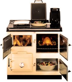 an old fashioned oven with food cooking in it